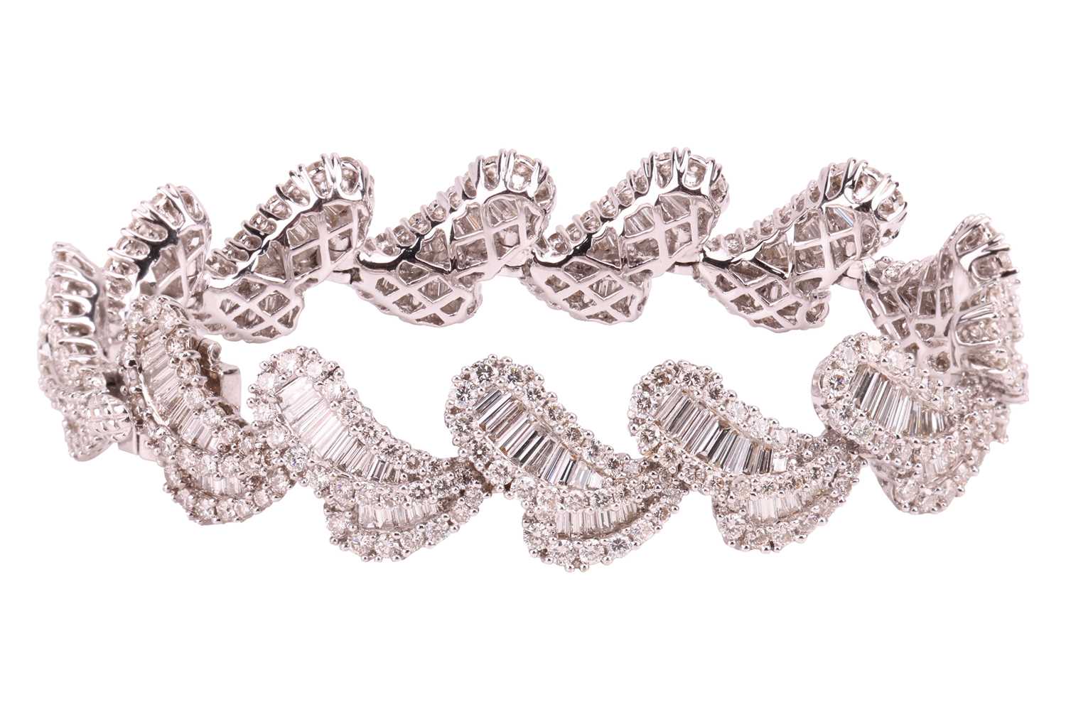 Lot 163 - A diamond-set bracelet of stylised petal...