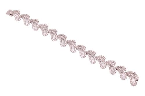 Lot 163 - A diamond-set bracelet of stylised petal...
