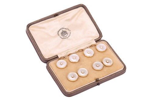 Lot 326 - A cased mother of pearl dress set, comprising...