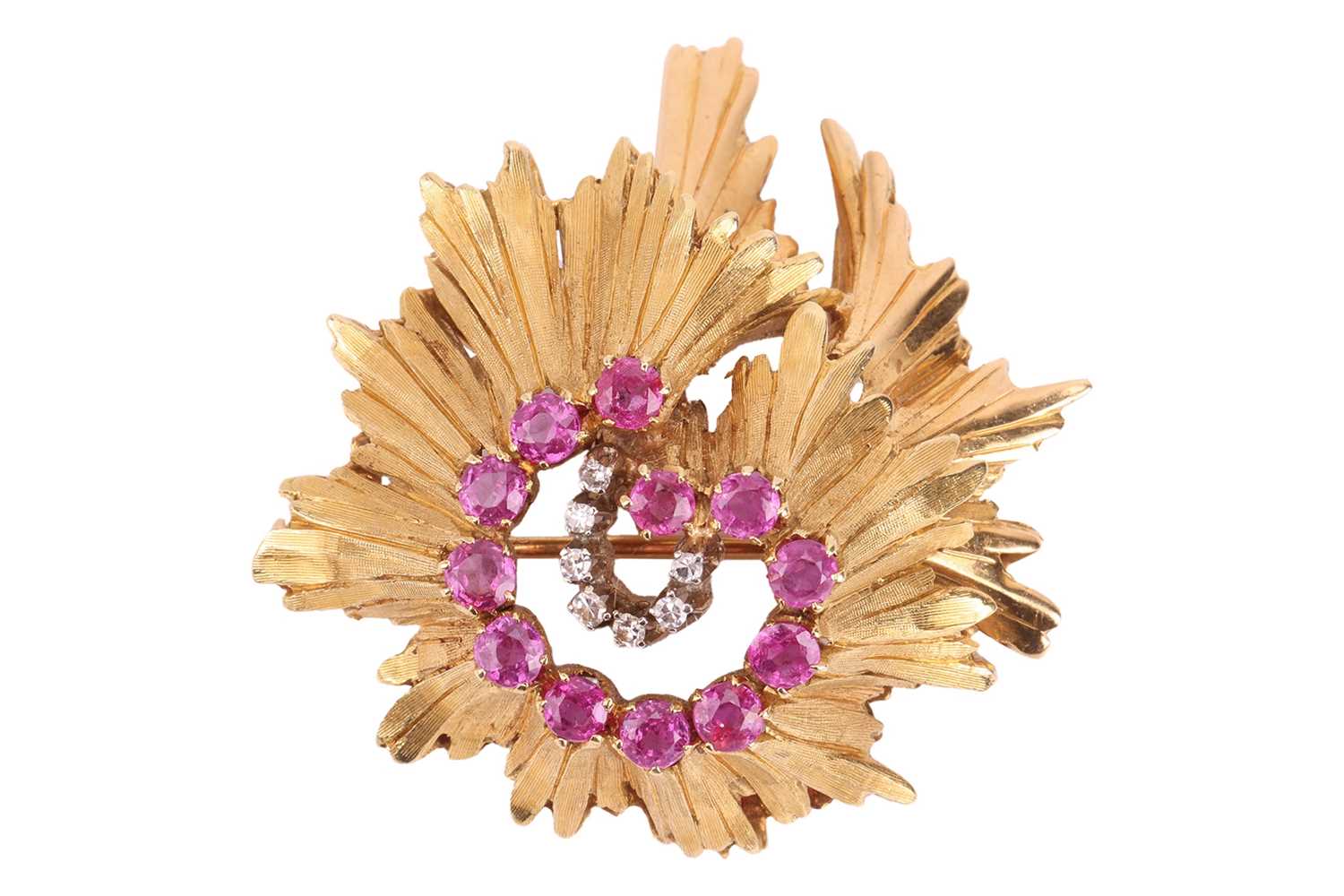 Lot 67 - A Modernist brooch set with pink sapphire and...