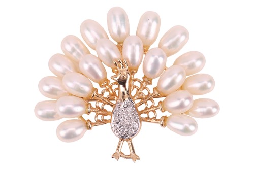Lot 223 - A gem-set peacock brooch cum pendant, sculpted...