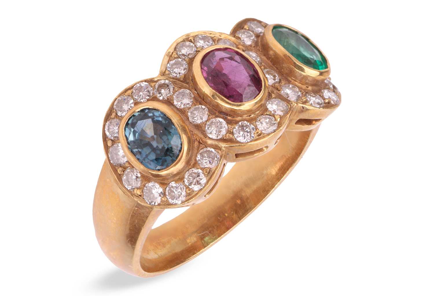 Lot 176 - A multi-gem triple cluster ring, bezel-set...