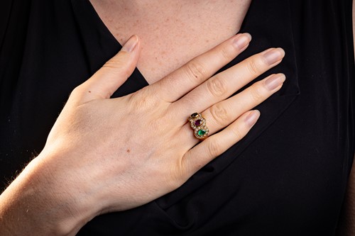 Lot 176 - A multi-gem triple cluster ring, bezel-set...