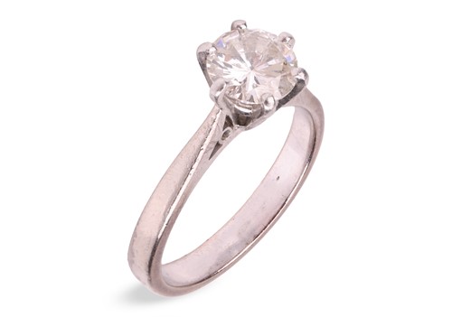 Lot 107 - A diamond solitaire ring, claw-set with a...