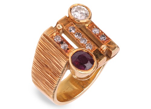 Lot 110 - A Modernist dress ring set with diamond and...
