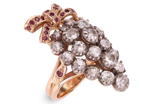 Lot 18 - A diamond and ruby cocktail ring, in the form...