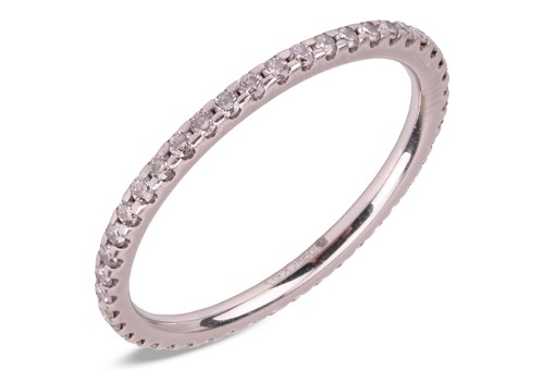 Lot 262 - A diamond eternity ring in platinum, the thin...