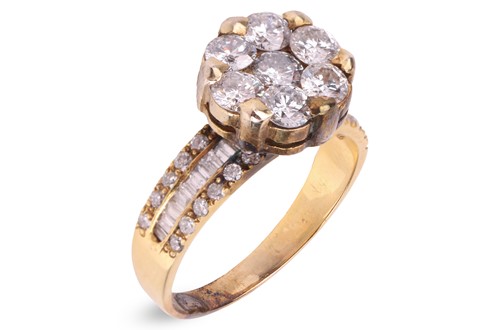Lot 90 - A CZ cluster ring, daisy head composed of...