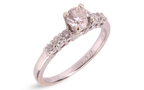 Lot 329 - A diamond solitaire ring, with an estimated...