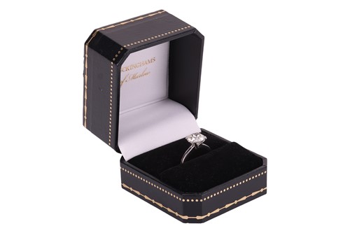 Lot 322 - A diamond solitaire ring in 18ct white gold,...
