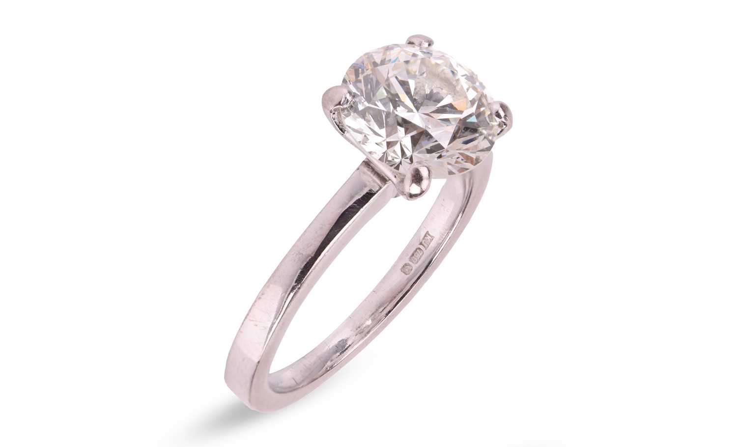 Lot 322 - A diamond solitaire ring in 18ct white gold,...