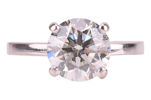 Lot 322 - A diamond solitaire ring in 18ct white gold,...