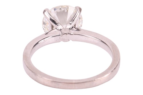 Lot 322 - A diamond solitaire ring in 18ct white gold,...