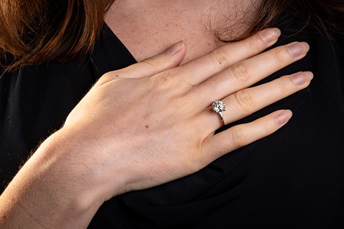 Lot 322 - A diamond solitaire ring in 18ct white gold,...