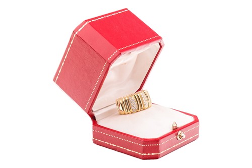 Lot 37 - Cartier - a diamond-set "Casque D'or" ring,...