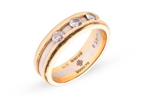 Lot 288 - Boodle & Dunthorne - a two-toned Amaré ring in...