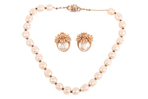 Lot 69 - Stanley Hagler - An imitation pearl and paste...