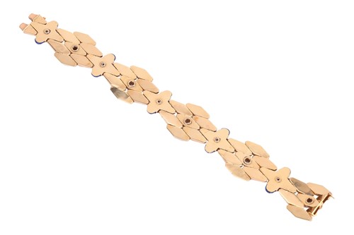 Lot 123 - A gem-set tri-toned bracelet, circa 1940s,...