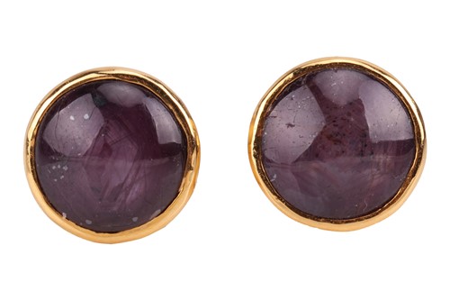 Lot 75 - A pair of purple star sapphire stud earrings,...