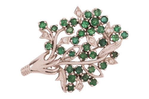 Lot 198 - An emerald and white sapphire brooch, designed...