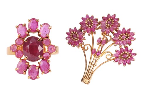 Lot 138 - A ruby-set cluster ring, of elongated design,...