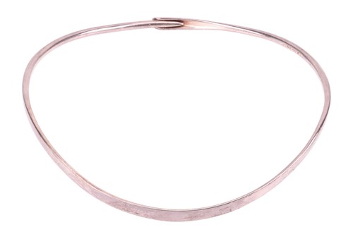 Lot 275 - Georg Jensen - A neckring, of sinuous form,...
