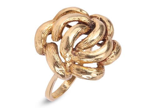 Lot 71 - A dress ring in the form of an abstract flower...