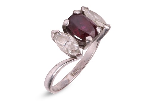 Lot 130 - A ruby and diamond-set ring, composed of an...