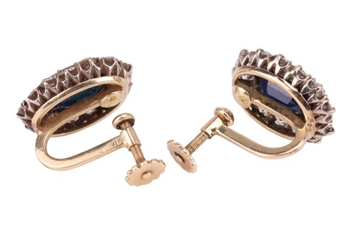 Lot 80 - A pair of sapphire and diamond cluster...