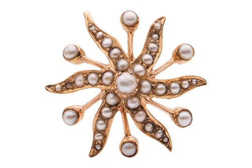 Lot 328 - A star brooch cum pendant set with split pearl,...