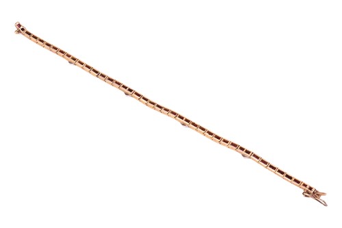 Lot 265 - An Art Deco gem-set line bracelet, comprising...