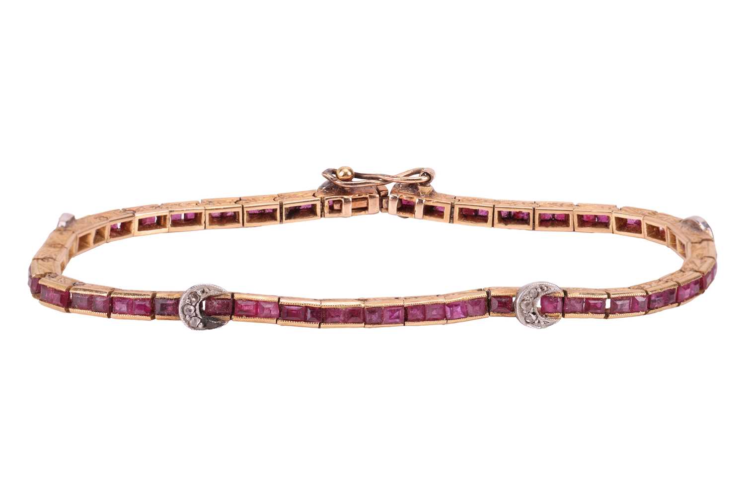 Lot 265 - An Art Deco gem-set line bracelet, comprising...