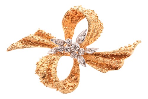 Lot 64 - A Modernist diamond-set bow brooch in 18ct...