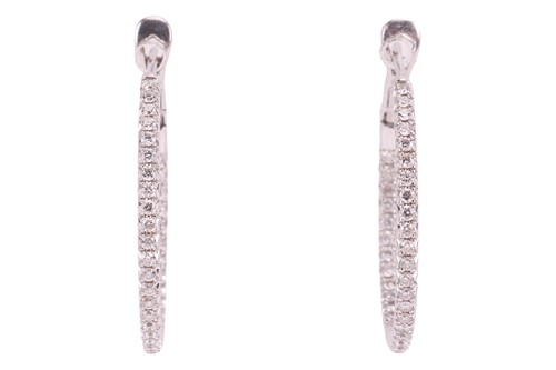 Lot 254 - A pair of 18ct white gold diamond-set hoop...