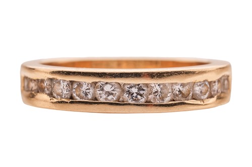 Lot 286 - A diamond half-eternity ring, featuring a...