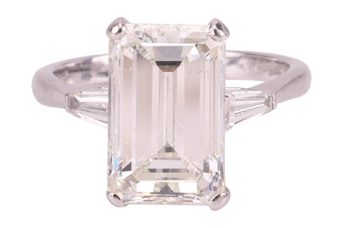 Lot 62 - Kutchinsky - an emerald-cut diamond solitaire,...