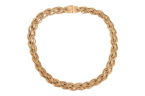 Lot 99 - A braided collar necklace in 18ct yellow gold,...