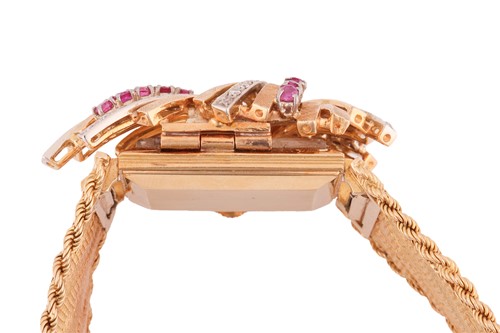 Lot 305 - Omega - A ruby and diamond-set concealed...