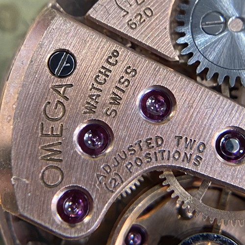 Lot 305 - Omega - A ruby and diamond-set concealed...
