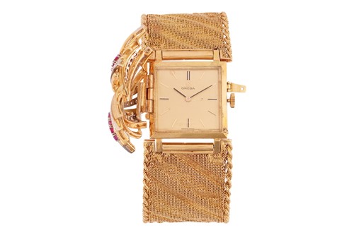 Lot 305 - Omega - A ruby and diamond-set concealed...