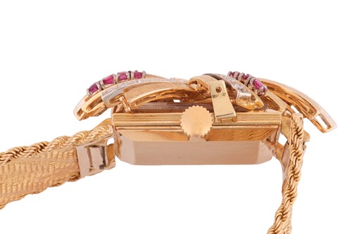 Lot 305 - Omega - A ruby and diamond-set concealed...