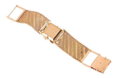 Lot 305 - Omega - A ruby and diamond-set concealed...
