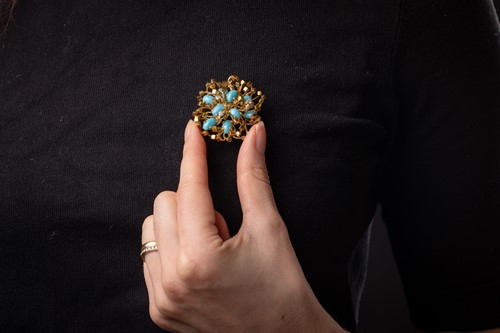 Lot 64 - A turquoise and diamond brooch, of an abstract...
