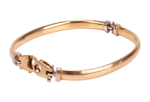 Lot 218 - A two-toned hinged bracelet, composed of two...