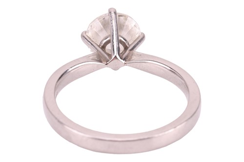 Lot 146 - A diamond solitaire ring in platinum, claw-set...