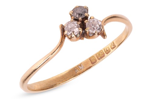 Lot 60 - An Edwardian-style three-stone trefoil style...