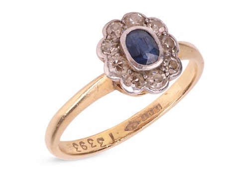 Lot 17 - A sapphire and diamond cluster ring,...