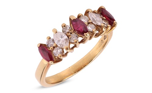 Lot 161 - A ruby and diamond half-hoop ring in 18ct gold,...
