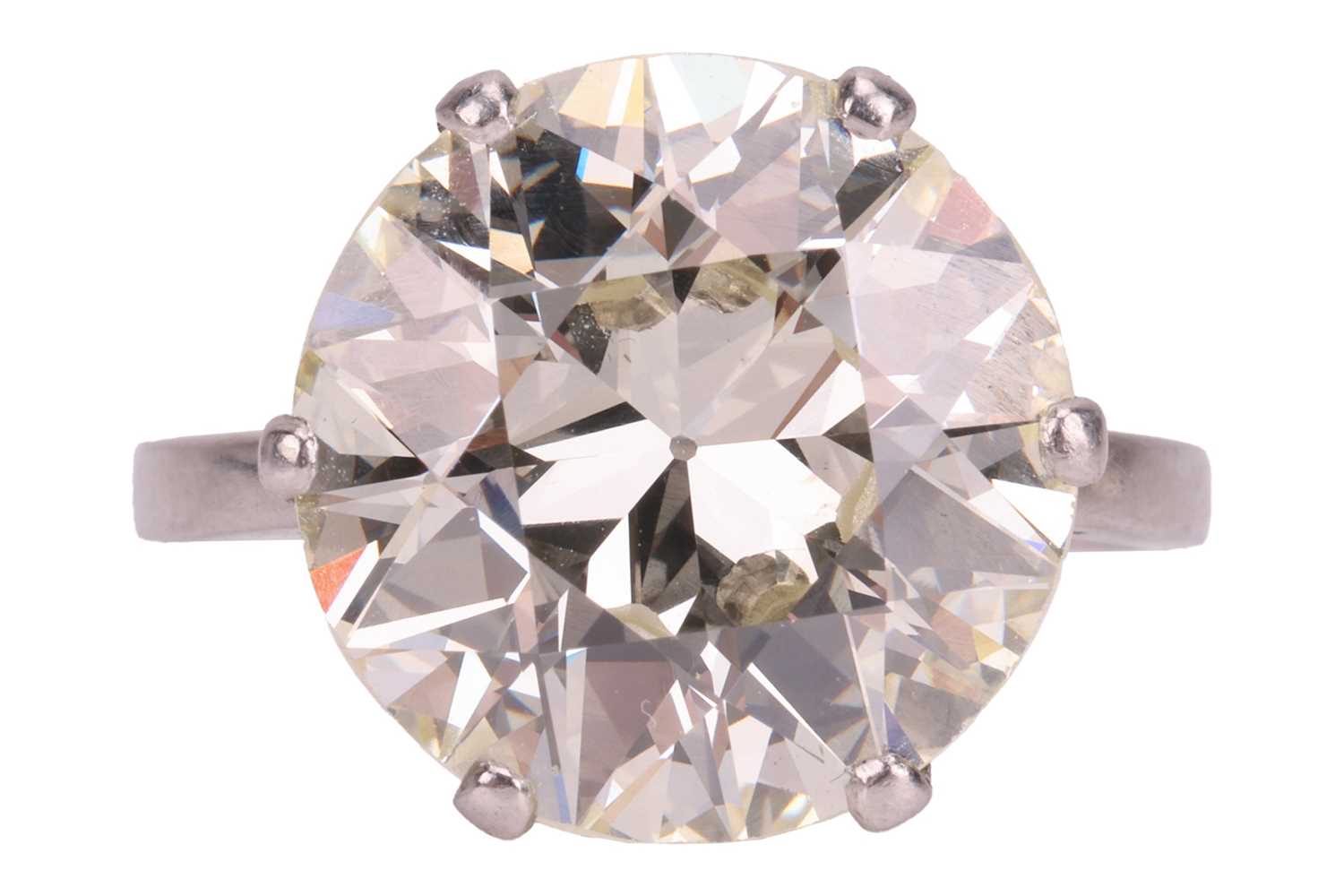 Lot 246 - A transitional-cut diamond solitaire ring, the...
