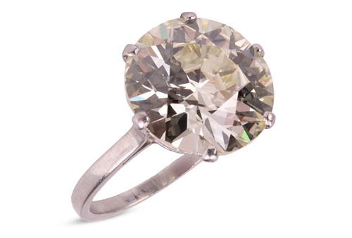 Lot 246 - A transitional-cut diamond solitaire ring, the...